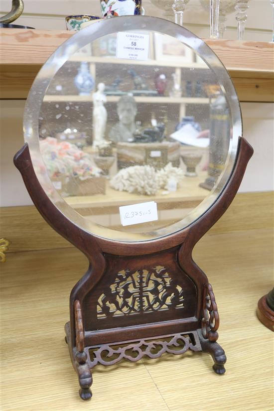 A Chinese hardwood mirror